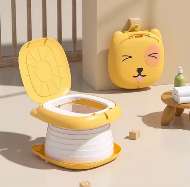 Портативный дорожный горшок для детей до 50 кг. + Чехол и Рулон пакетов Yellow 115782 фото